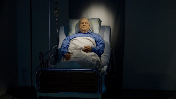 A life sized replica of former Israeli Prime Minister Ariel Sharon in hospital bed, an installation by Israeli artist Noam Braslavsky, is exhibited at the Kishon gallery in Tel Aviv, Israel, Tuesday, Oct. 19, 2010. The exhibition presenting Braslavky's artwork is due to open Thursday. Over four years after a devastating stroke, Ariel Sharon remains in a coma. (AP Photo/Ariel Schalit)