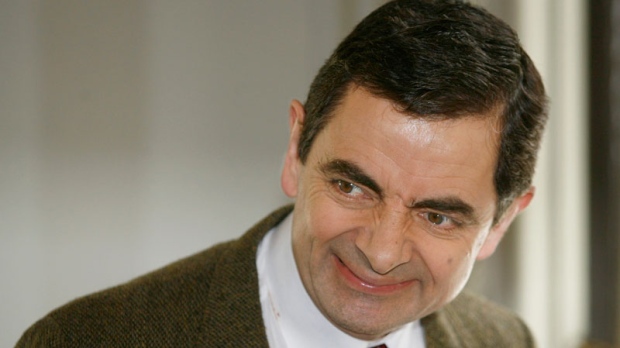 British actor Rowan Atkinson playing the part of character 'Mr Bean' arrives for a meeting with photographers in Madrid, Tuesday, March 20, 2007. (AP / Daniel Ochoa de Olza)