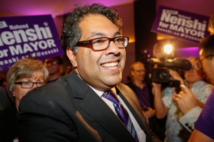 Calgary Mayor Naheed Nenshi celebrates his re-election as mayor at his campaign party in Calgary, Monday, Oct. 21, 2013. (Jeff McIntosh / THE CANADIAN PRESS)