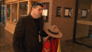 RCMP Cpl. Ron Francis arrives at RCMP J-Division headquarters in Fredericton to hand over his red serge uniform on Nov. 29, 2013. (CTV Atlantic)