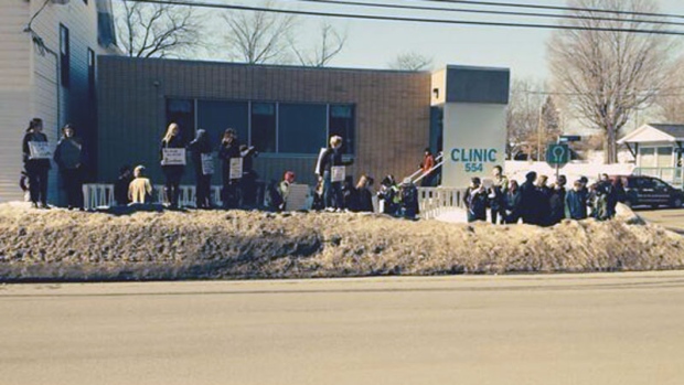 Pro-abortion supporters gather outside the Morgentaler Clinic in Fredericton after it was announced the facility would be closing. (CTV Atlantic)