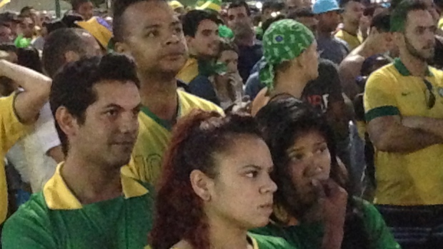 Nail-biting soccer fans on Copacabana Beach