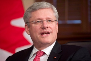 Prime Minister Stephen Harper speaks to the media in his office in Ottawa, Thursday June 26, 2014. (Adrian Wyld / THE CANADIAN PRESS)