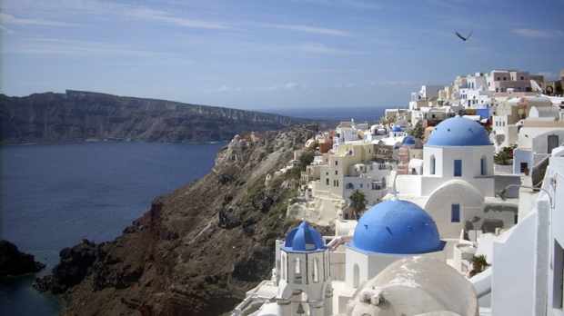 This Sept. 21, 2009 photo shows a view of Oia village on the island of Santorini, Greece. (AP Photo/Michael Virtanen)