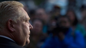 Doug Ford speaks to the media outside his mother's Etobicoke home on Friday September 12, 2014. (Chris Young / THE CANADIAN PRESS)