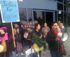 Rocco Trigueros (right), director of the group 'Mexicans Living in Vancouver,' leads a demonstration by concerned immigrant advocates outside the coroners' inquest for Lucia Vega Jimenez in Burnaby, B.C., on Monday, Sept.29, 2014. (Tamsyn Burgmann / THE CANADIAN PRESS)