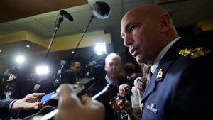 RCMP Commissioner Bob Paulson speaks to media after appearing at Senate National Security and Defence committee in Ottawa on Monday, Oct. 27, 2014. (Sean Kilpatrick / THE CANADIAN PRESS)