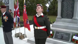 Cadet Ceilidh Bond, 15, stands guard at the cenotaph in Sydney, N.S.