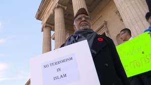 Muslims gather on the steps of the Manitoba Legislature Building to rally against the killing of Canadian soldiers on Sunday Nov. 2, 2014.