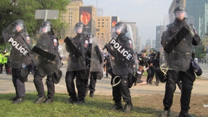 The arrest of Dorian Barton at a G20 protest on June 26, 2010. (THE CANADIAN PRESS / HO)