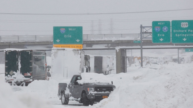 Vehicles are piled high with snow on the Thruway between Walden Ave. and Ridge Rd. in Cheektowaga, N.Y., Wednesday, Nov. 19, 2014. (The Buffalo News, Sharon Cantillon) 