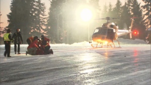 An injured hiker was airlifted by rescue crews after he fell from Tim Jones Peak atop Mount Seymour Sat., Nov. 29, 2014. (CTV)