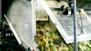 A truck drops of organic waste at a processing plant in Ste-Hyacinthe, Que.