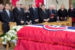 Dignitaries look on behind the casket of Jean Beliveau at the funeral for the former Montreal Canadiens captain at Mary Queen of the World Cathedral in Montreal, Wednesday, Dec.10, 2014. (Paul Chiasson / THE CANADIAN PRESS)