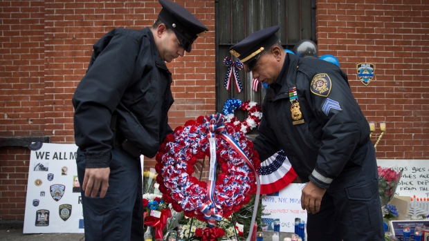 Wake to be held for 1 of 2 NYPD officers killed in ambush shooting.