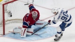 Tampa Bay Lightning's Vladislav Namestnikov scores past Montreal Canadiens goalie Carey Price during second period NHL hockey action in Montreal on March 30, 2015. (Paul Chiasson / THE CANADIAN PRESS )