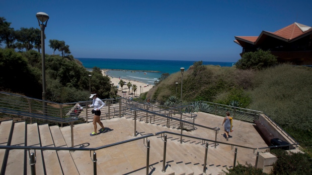 Woman jogging in Netanya