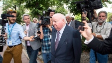 Mike Duffy arrives at the court