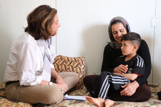 Lisa LaFlamme talks to Hanif in a refugee camp