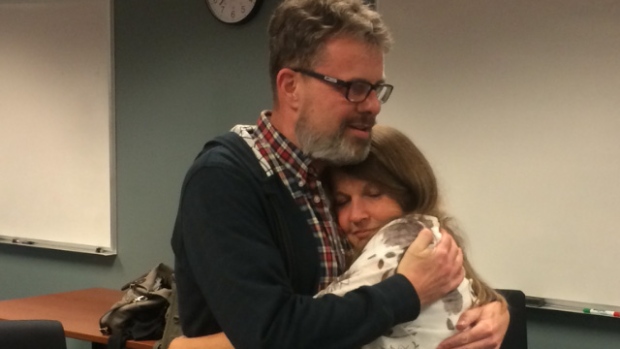 Kevin Garratt hugs Julia Garratt