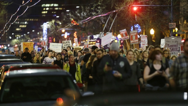 Protesters march against Trump in Seattle