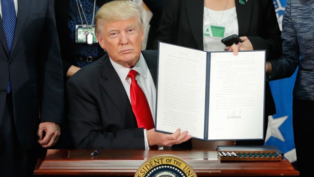 U.S. President Donald Trump signs executive order