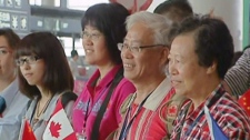 Hundreds of Chinese tourists arrive in Vancouver on Wednesday, Aug. 18, 2010.