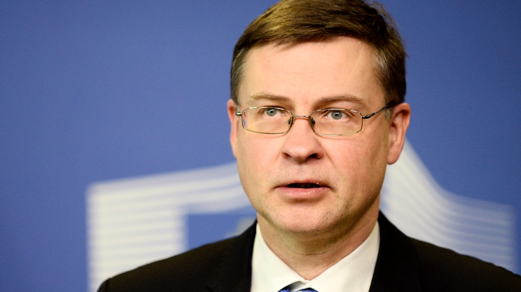 European Commissioner for An Economy that Works for People Valdis Dombrovskis speaks during a media conference at EU headquarters in Brussels, Wednesday, Feb. 10, 2021. (Johanna Geron, Pool via AP)
