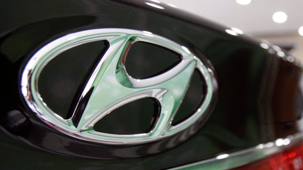 The logo of Hyundai Motor Co. is seen on its car at the company's showroom in Seoul, South Korea on July 26, 2012. (AP / Ahn Young-joon)