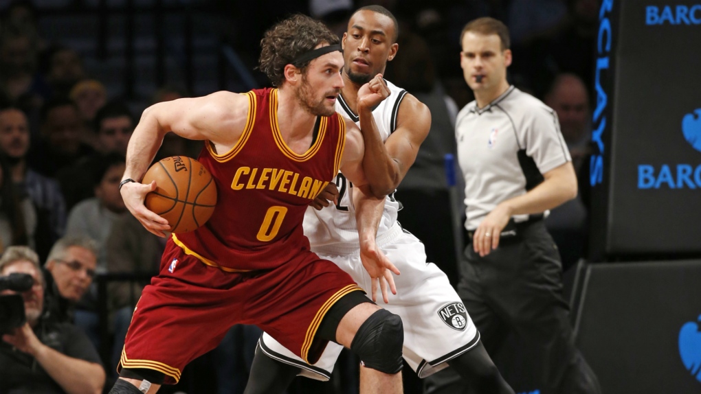 Brooklyn Nets guard Markel Brown defends Cleveland Cavaliers forward Kevin Love in the second half of an NBA basketball game in New York on Wednesday, Jan. 20, 2016. (AP / Kathy Willens)