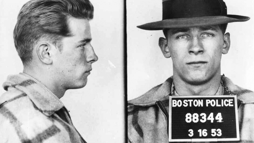 These 1953 file Boston police booking photos provided by The Boston Globe shows James "Whitey" Bulger after an arrest. (Boston Police/The Boston Globe via AP)