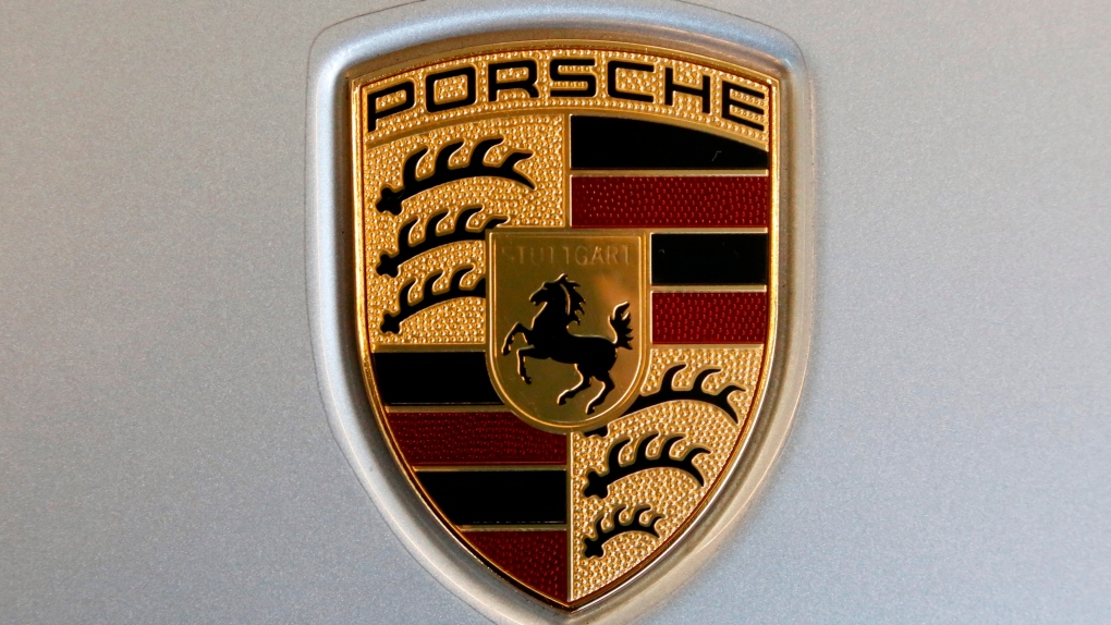 The Feb. 15, 2018 file photo shows a Porsche logo on a 2018 718 Cayman automobile on display at the Pittsburgh Auto Show.  (AP Photo/Gene J. Puskar, file)