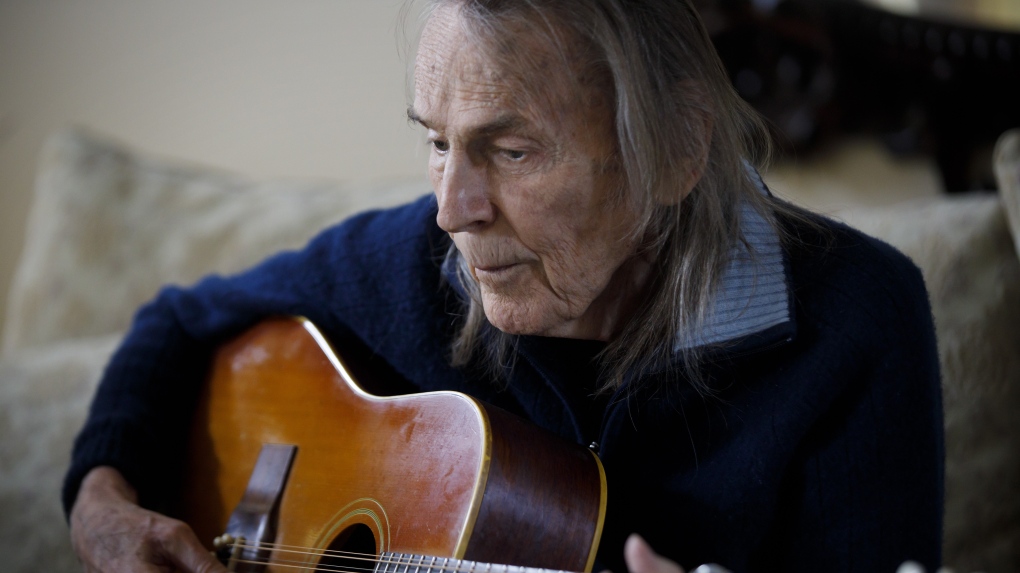 Canadian musician Gordon Lightfoot strums his guitar in his Toronto home on Thursday, April 25, 2019. THE CANADIAN PRESS/Cole Burston