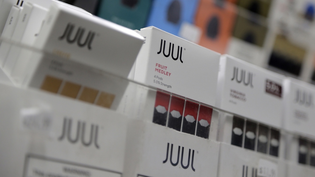 Juul products are displayed at a smoke shop in New York, on Dec. 20, 2018. (Seth Wenig / AP)