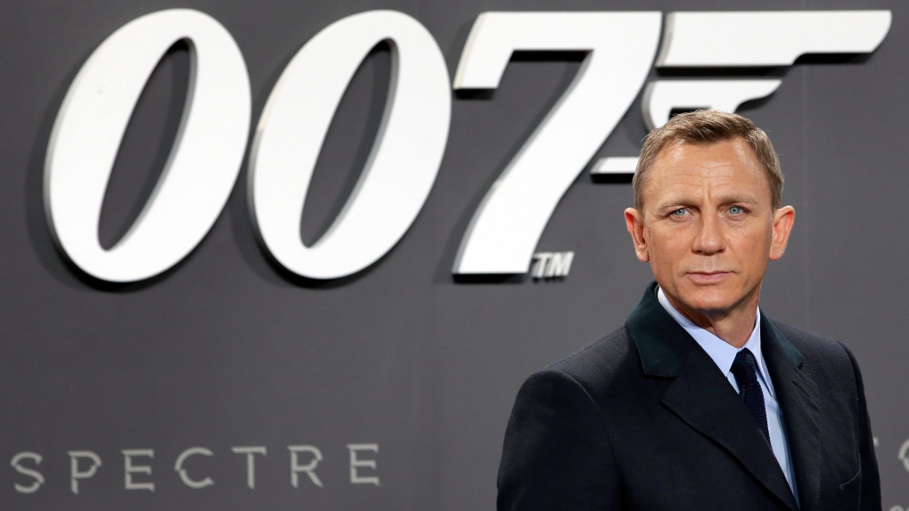 This is a Wednesday, Oct. 28, 2015 file photo of actor Daniel Craig poses for the media as he arrives for the German premiere of the James Bond movie 'Spectre' in Berlin, Germany. (AP Photo/Michael Sohn/File)