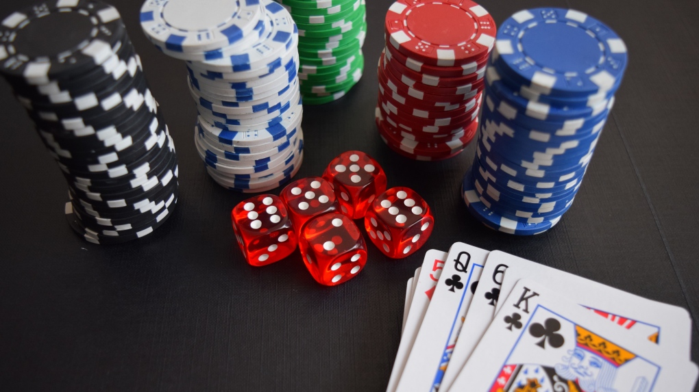 Poker chips, dice and playing cards are seen in this file photo. (Pixabay / Pexels)