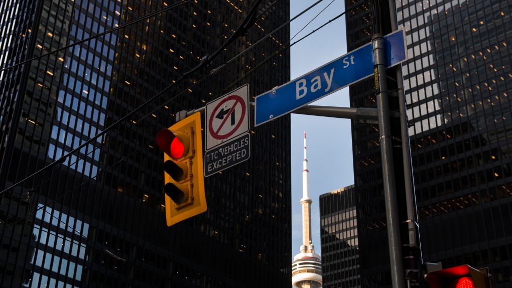 A red light on Bay Street in Canada's financial district is shown in Toronto on Wednesday, March 18, 2020. THE CANADIAN PRESS/Nathan Denette 
