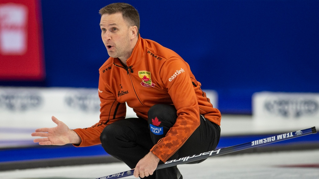 Team Gushue skip, Brad Gushue watches path of his rock during men's final of the 2021 Canadian Olympic curling trials against Team Jacobs, in Saskatoon, Sask., Sunday, Nov. 28, 2021. THE CANADIAN PRESS/Rick Elvin 