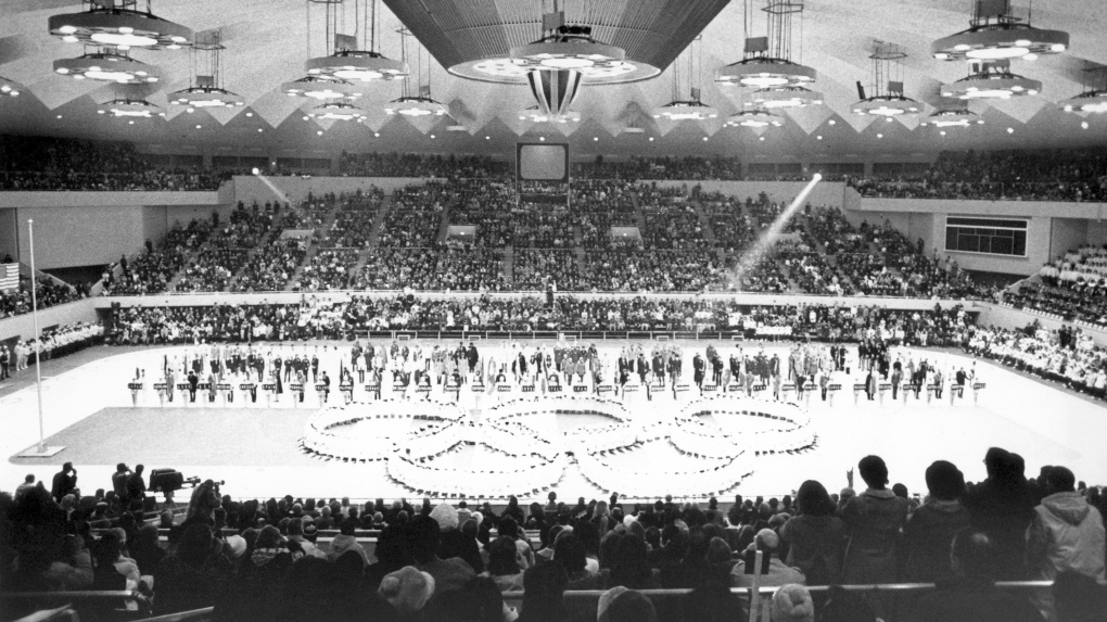In this Feb. 13, 1972, file photo, Olympic rings in the center of the Makomanai ice arena is seen during the closing ceremony of the Winter Olympics, in Sapporo, Japan. (AP Photo) 