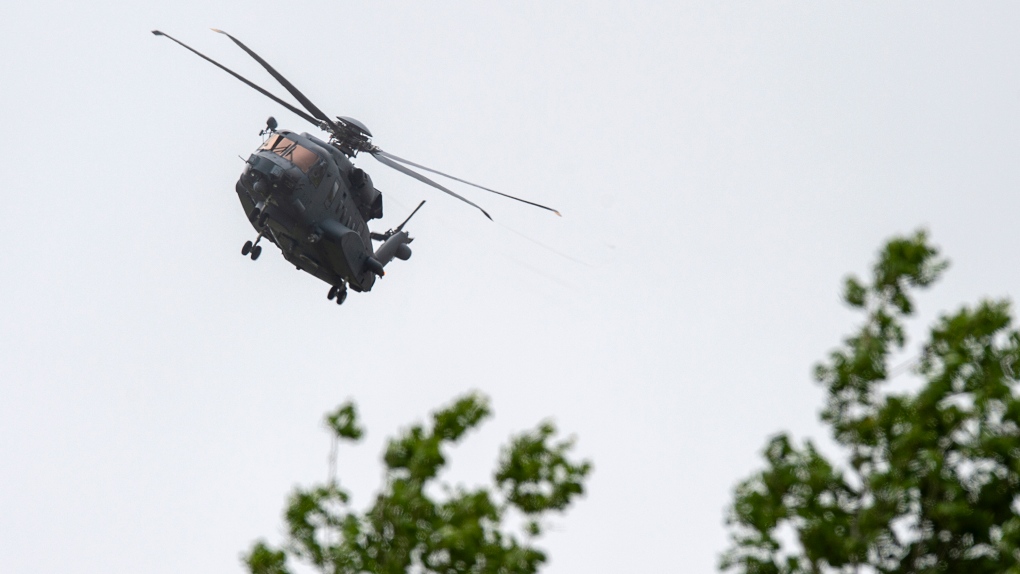 A CH-148 Cyclone helicopter from 12 Wing Shearwater, home of 423 Maritime Helicopter Squadron, flies near the base in Eastern Passage, N.S. on Tuesday, June 23, 2020. (THE CANADIAN PRESS / Andrew Vaughan)