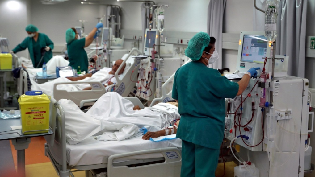 Nurses check patients undergoes dialysis at the Lebanese American University Medical Center-Rizk Hospital in Beirut, Lebanon, on June 10, 2021. (Bilal Hussein / AP) 