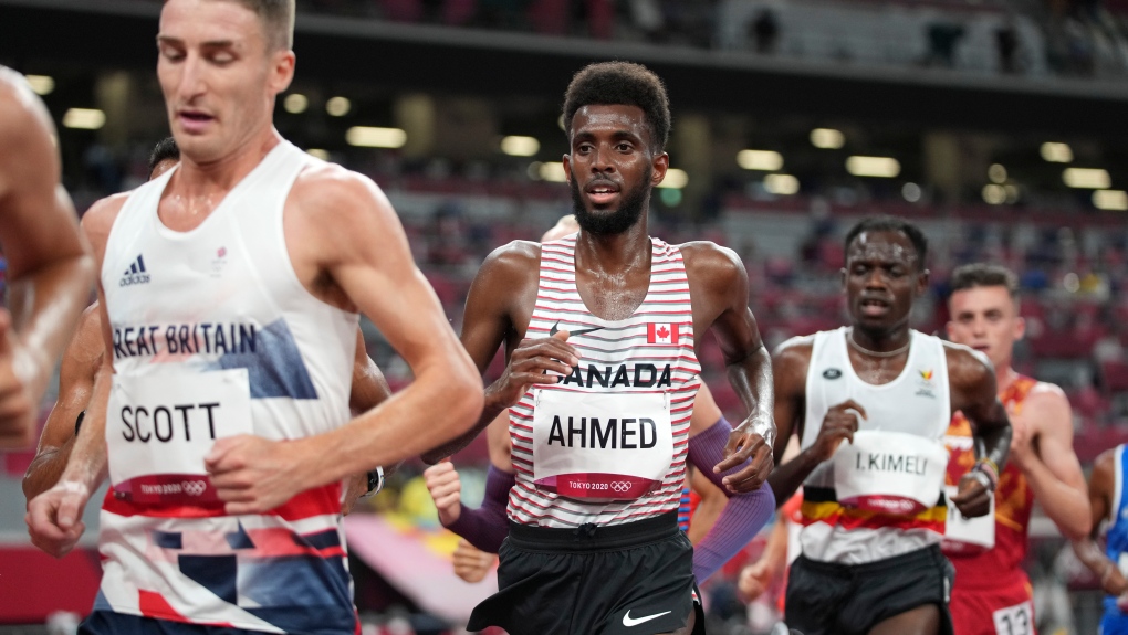 Canada's Mohammed Ahmed runs in the men's 10,000-metre final at the 2020 Summer Olympics, July 30, 2021, in Tokyo. (AP Photo/Matthias Schrader)