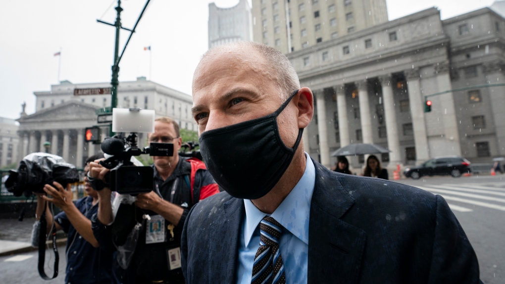 In this file photo, Michael Avenatti departs a scheduled sentencing at Manhattan federal court, Thursday, July 8, 2021, in New York. (AP Photo/John Minchillo) 
