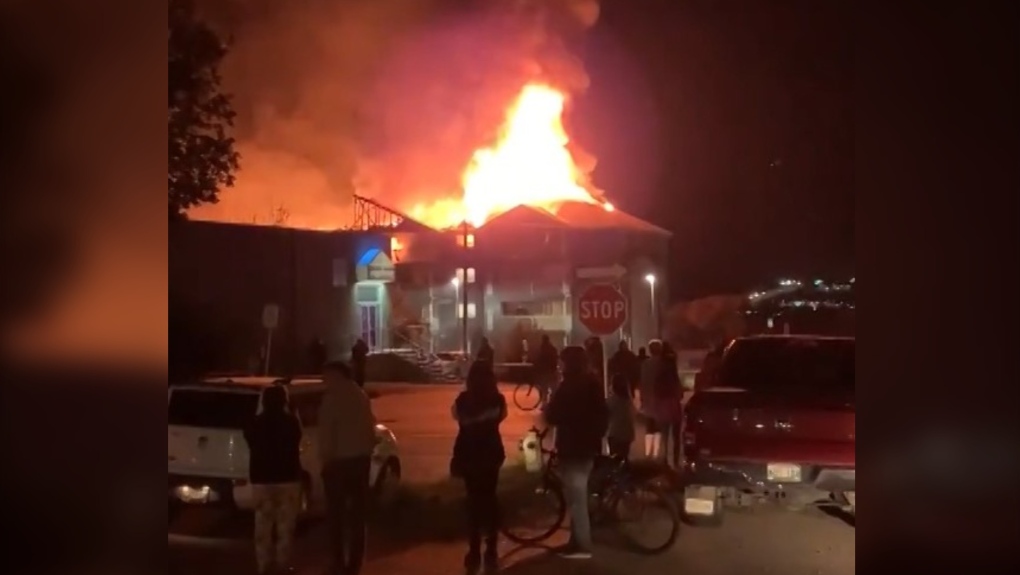 Brandon condo building engulfed in flames; fire shooting from roof