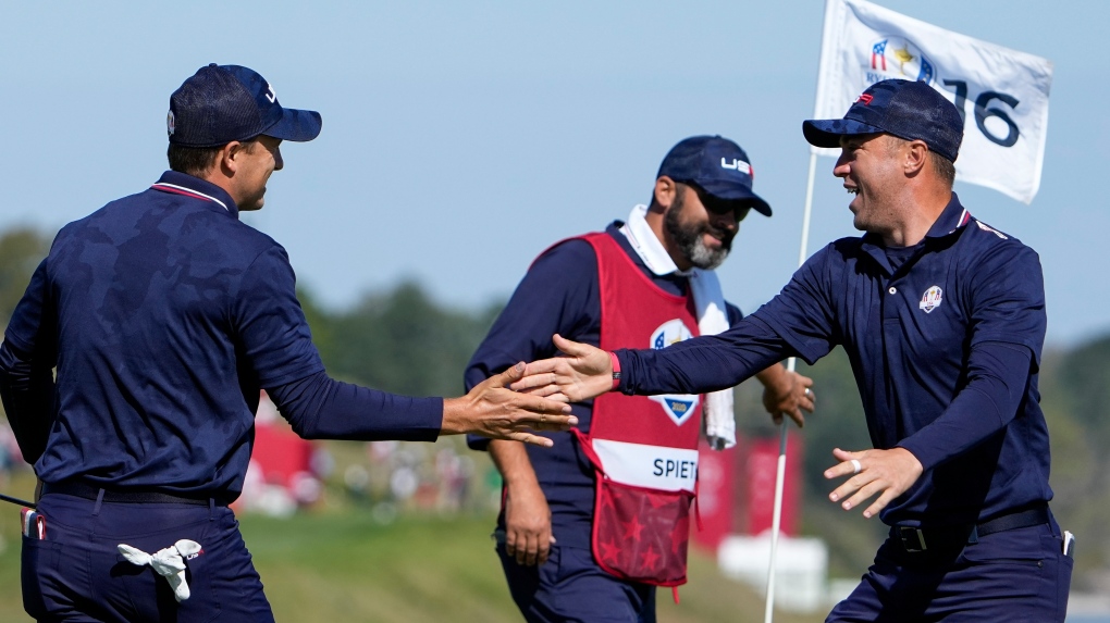 Team USA's Justin Thomas and Team USA's Jordan Spieth celebrate on the 16th hole during a foursomes match the Ryder Cup at the Whistling Straits Golf Course Saturday, Sept. 25, 2021, in Sheboygan, Wis. (AP Photo/Jeff Roberson)