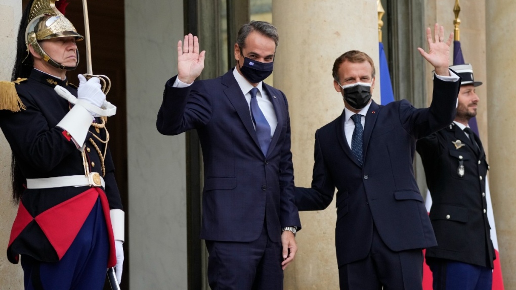 French President Emmanuel Macron and Prime Minister Kyriakos Mitsotakis at the Elysee Palace in Paris, on Sept. 28, 2021. (Francois Mori / AP) 