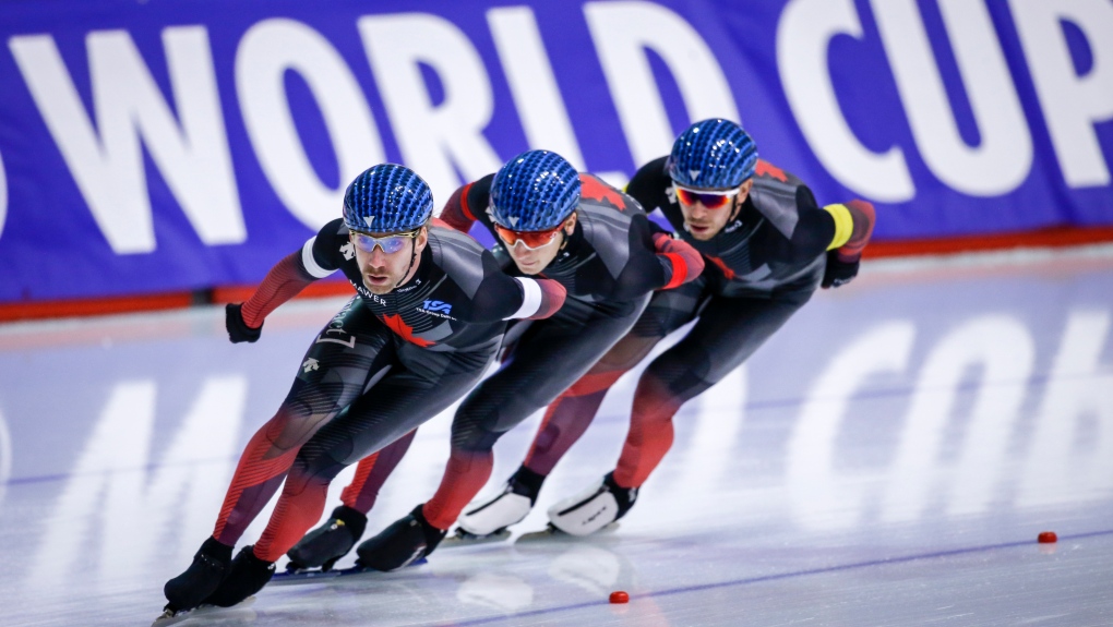 Canada's Ted-Jan Bloemen, left, leads teammates Connor Howe, centre, and Jordan Belchos during the men's team pursuit competition at the ISU World Cup speed skating event in Calgary, Alta., Sunday, Dec. 12, 2021.THE CANADIAN PRESS/Jeff McIntosh 