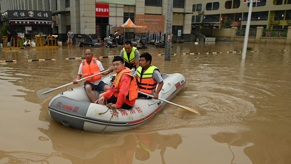 Dozens of Chinese officials have been punished over their response to devastating floods that killed hundreds last July, pictured here, in Zhengzhou, China, on July 23, 2021 after a government investigation found authorities had under-reported deaths and deliberately withheld information. (Noel Celis/AFP/Getty Images)