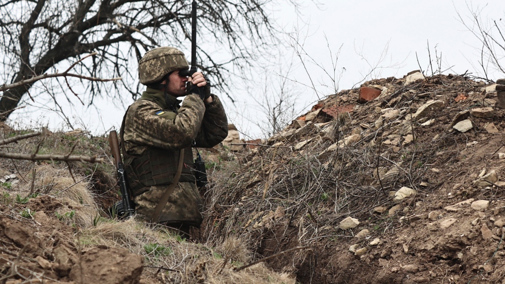 A Ukrainian soldier is seen at a fighting position on the line of separation from pro-Russian rebels near Donetsk, Ukraine, on April 12, 2021. (AP Photo)