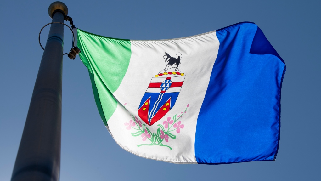 The Yukon provincial flag flies on a flag pole in Ottawa, Monday July 6, 2020. (THE CANADIAN PRESS/Adrian Wyld)